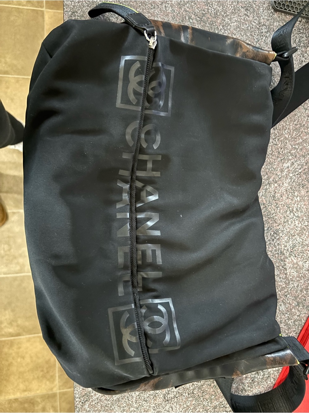 CHANEL Black Nylon Messenger Bag with Subtle Logo Print and Dark Brown Accents